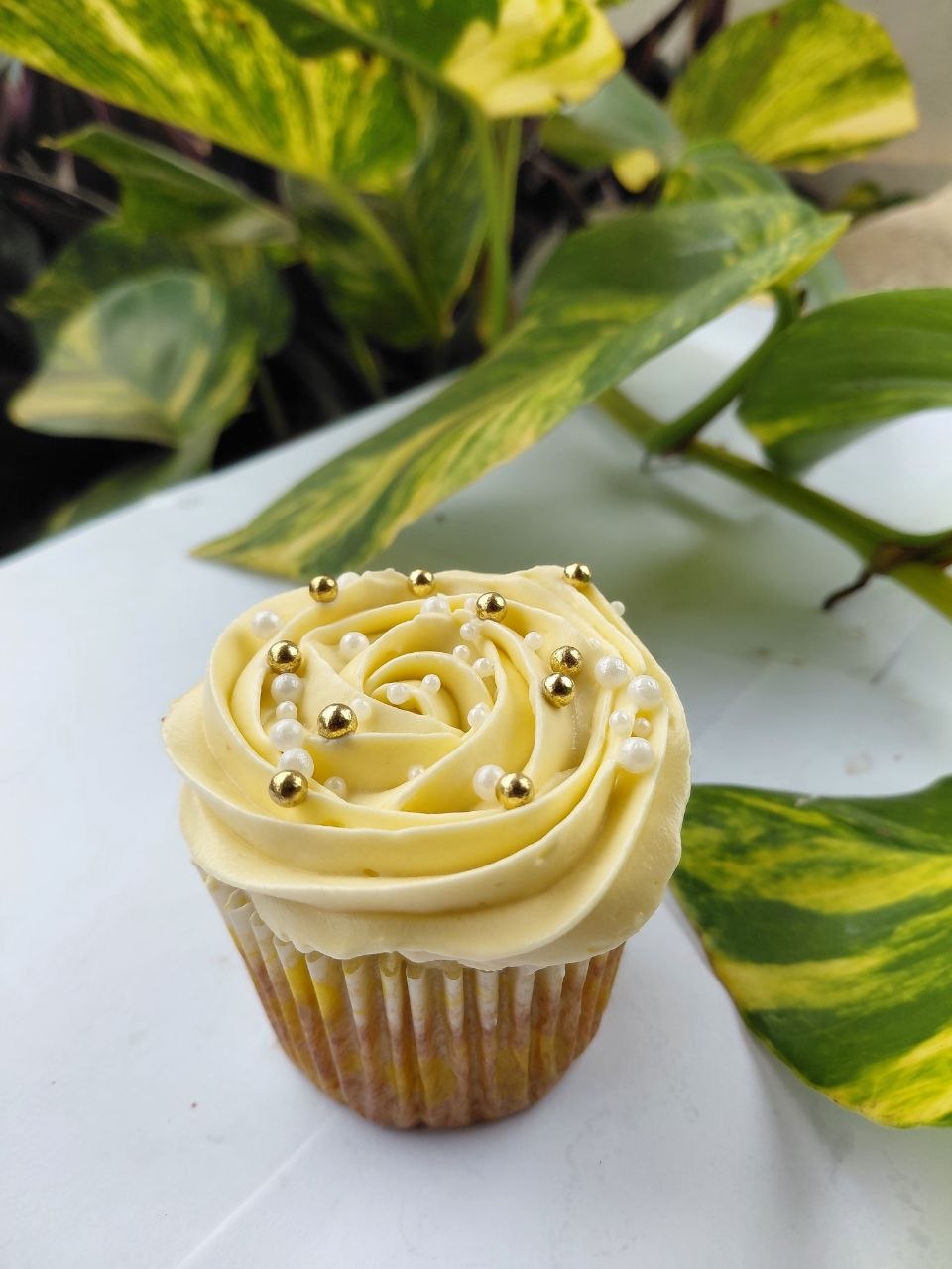 Swirled frosting on a freshly baked Madge Treats cupcake in Accra